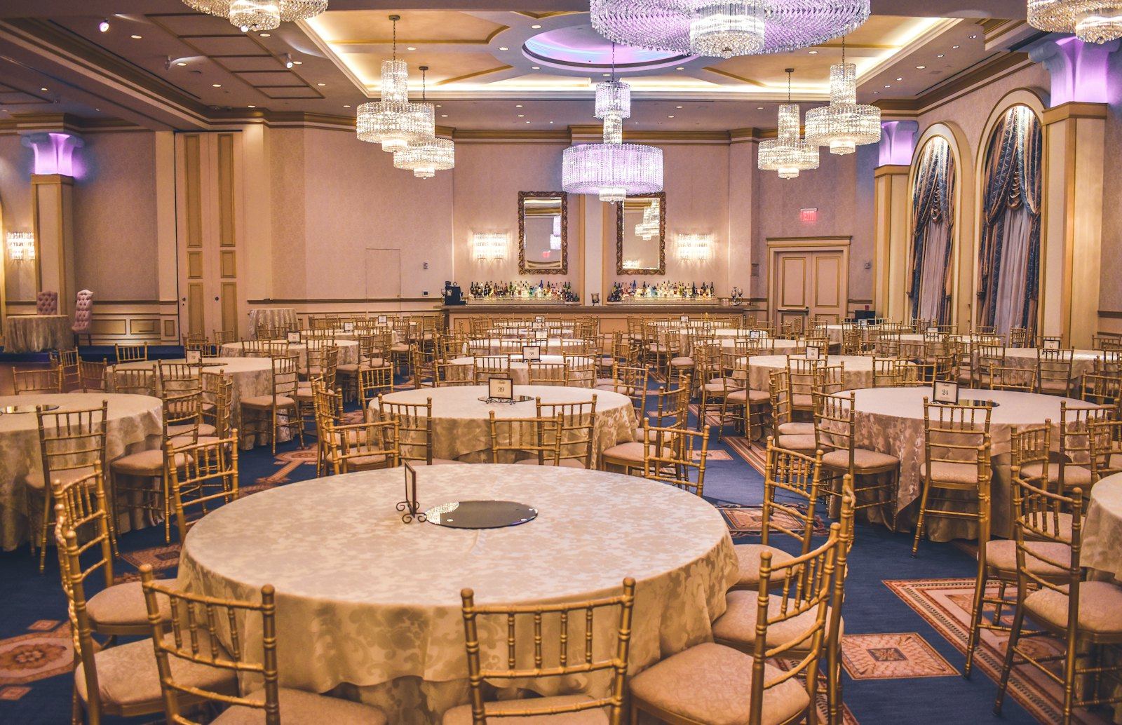Round banquet tables set for a formal dinner